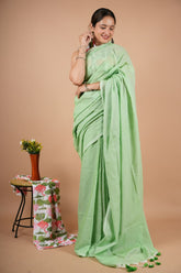 Graceful Light Green Pure Modal Silk Saree with Tassel Detailing & Blouse Piece