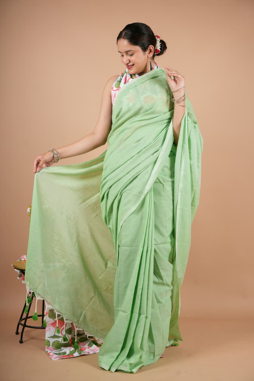 Graceful Light Green Pure Modal Silk Saree with Tassel Detailing & Blouse Piece