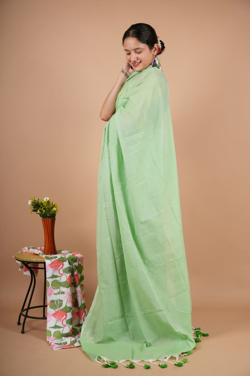 Graceful Light Green Pure Modal Silk Saree with Tassel Detailing & Blouse Piece