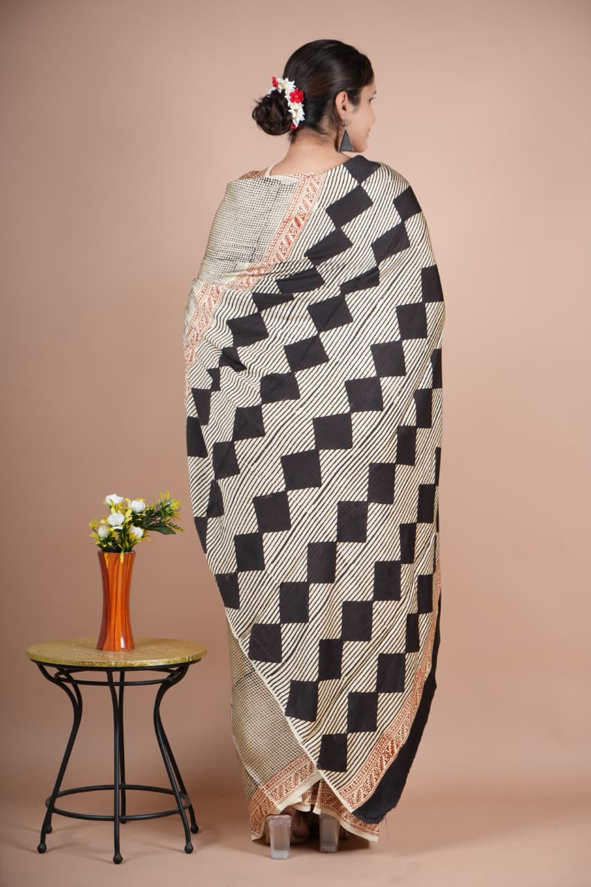 Beautiful Pure Modal Silk Saree – Off-White with Black Geometric Print & Multicolor Triangle Pallu
