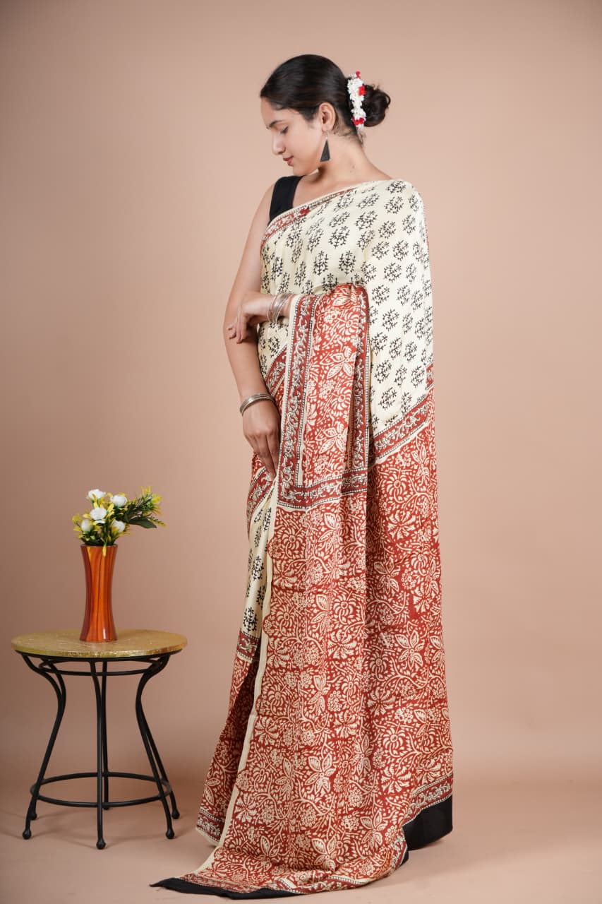 Elegant Pure Modal Silk Saree – Cream with Black Floral Buti & Rust Red Pallu